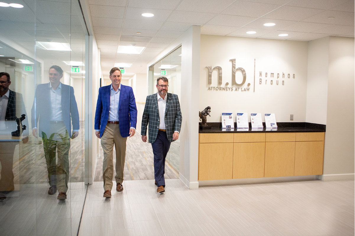 Image of George Nemphos and Tim Braue on Nemphos Braue's website
