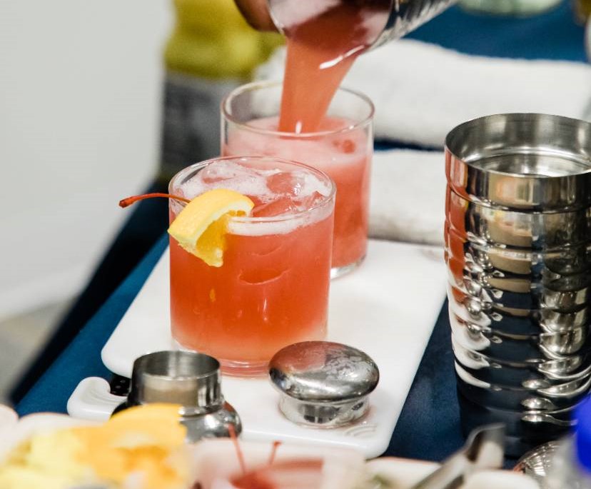 Image of someone making cocktails on Nemphos Braue's website