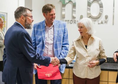 Image of the attorneys receiving a Proclamation image on Nemphos Braue's website