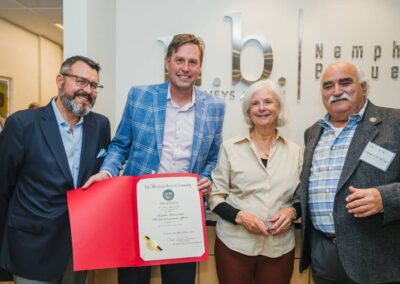 Image of the attorneys receiving a Proclamation image on Nemphos Braue's website