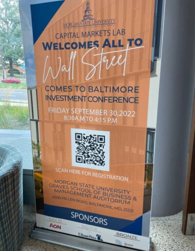 Wall Street Comes to Baltimore sign image on Nemphos Braue's website