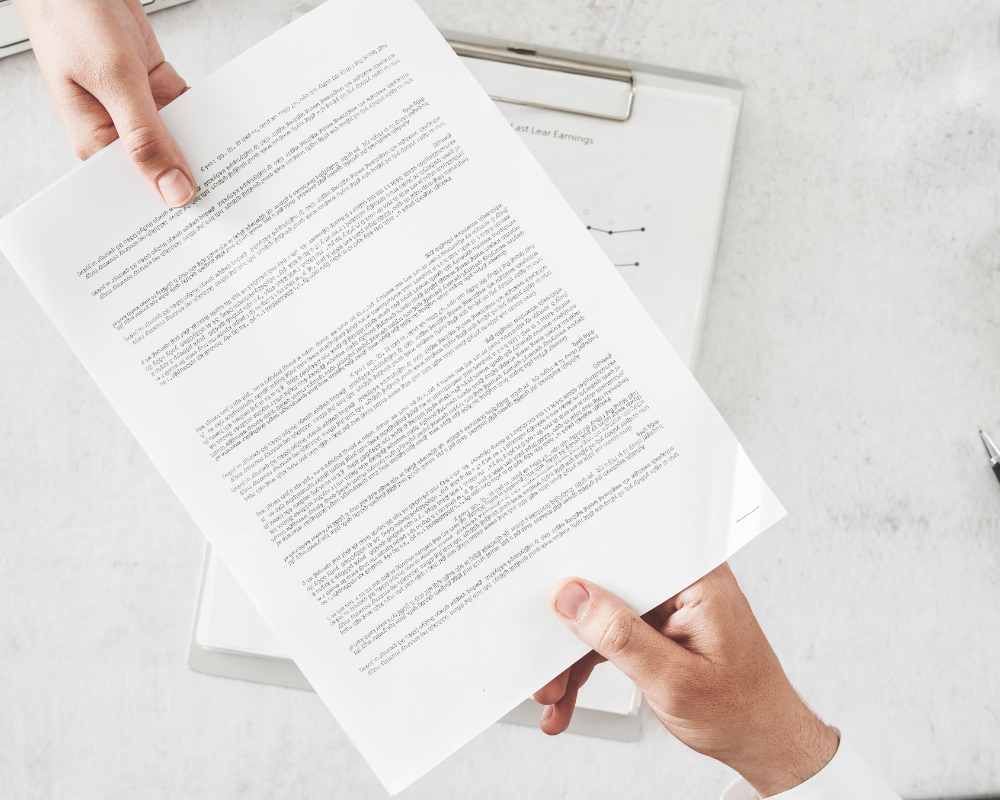 Image of documents and agreements on Nemphos Braue's website