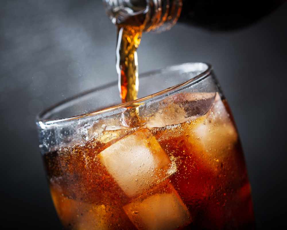 Image of soda being poured into a glass