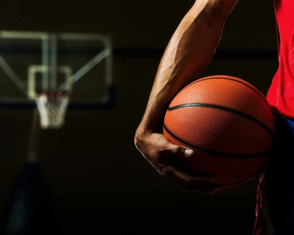 baskeball in hand baskeball in hand